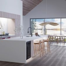 A kitchen area with varying light fixtures and lowered shades.